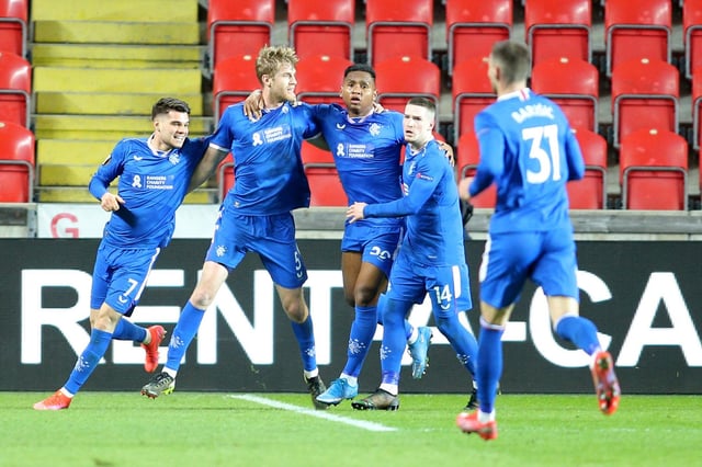 Rangers' Swedish defender Filip Helander (2nd L) celebrates scoring with his team-mates during the UEFA Europa League, last 16, first Leg football match Slavia Prague v Rangers at the Eden Arena stadium in Prague, Czech Republic, on March 11, 2021. (Photo by Milan Kammermayer / AFP) (Photo by MILAN KAMMERMAYER/AFP via Getty Images)