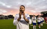 Stephen Dobbie salutes the Queen of the South support at the close of his testimonial encounter against a Scotland's legends team. The striker, the Palmerston club's second-top scorer of all-time, cherishing his relationship with the Dumfries club and philosophical about never earning the cap it is generally regarded his talents merited. (Photo by Ross Parker / SNS Group)