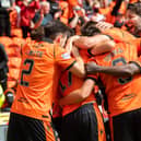 Charlie Mulgrew, far right, joins in the Dundee United celebrations after defeating Rangers 1-0 at Tannadice.