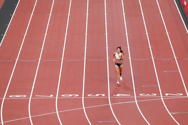 Katarina Johnson-Thompson managed to get up and limp to the finish line after her injury but was later disqualified. Picture: Ryan Pierse/Getty Images