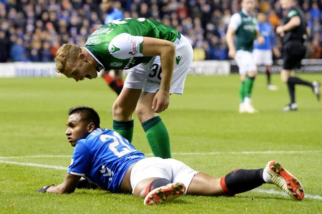 Hibs defender Ryan Porteous exchanges words with Rangers striker Alfredo Morelos during a match in 2018.