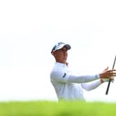 Grant Forrest plays his shot from the fourth tee in Singapore.