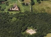 The 'new' Caerlaverock Castle (top) was built only a short distance away from the original moated mansion, on ground just 7m above normal sea level -- researchers have revealed that both fortifications were affected by storm surges during a period of climate change between 1200 and 1570. Picture: RCAHMS