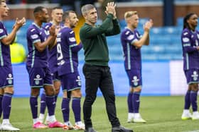 Nick Montgomery and the Hibs players applaud the travelling support following the 2-2 draw at Kilmarnock.