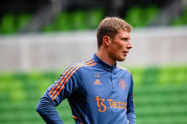 Manchester United defender Will Fish is set to join Hibs on loan.