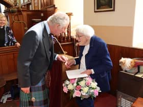 Church organist Mary Edmondson, 89, who has been playing for 75 years has been honoured for her dedication with a surprise presentation by the Prince of Wales. Picture: Neil Buchan/PA Wire