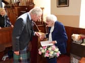 Church organist Mary Edmondson, 89, who has been playing for 75 years has been honoured for her dedication with a surprise presentation by the Prince of Wales. Picture: Neil Buchan/PA Wire