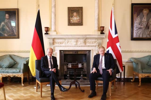 Prime Minister Boris Johnson meets German Chancellor Olaf Scholz in Downing Street.