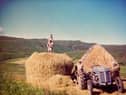 Haystacks and kids at Satran in 1963. PIC: Minginish Centenary Project.