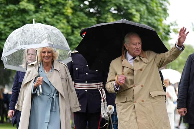 King Charles III and Queen Camilla arrive to unveil a Commemorative Cairn to mark the centenary of the Kirkcaldy War Memorial, as part of their trip to Scotland for Holyrood Week. Picture: Aaron Chown/PA Wire