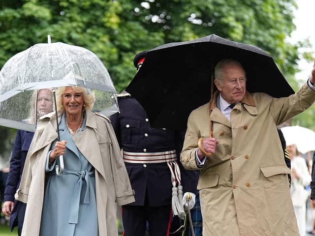 King Charles III and Queen Camilla arrive to unveil a Commemorative Cairn to mark the centenary of the Kirkcaldy War Memorial, as part of their trip to Scotland for Holyrood Week. Picture: Aaron Chown/PA Wire