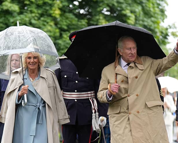 King Charles III and Queen Camilla arrive to unveil a Commemorative Cairn to mark the centenary of the Kirkcaldy War Memorial, as part of their trip to Scotland for Holyrood Week. Picture: Aaron Chown/PA Wire