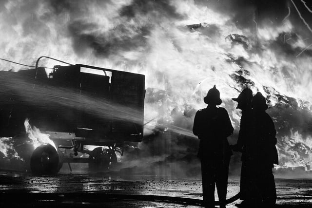 Firemen take on the flames during the blaze that hit the yard in 1965.
