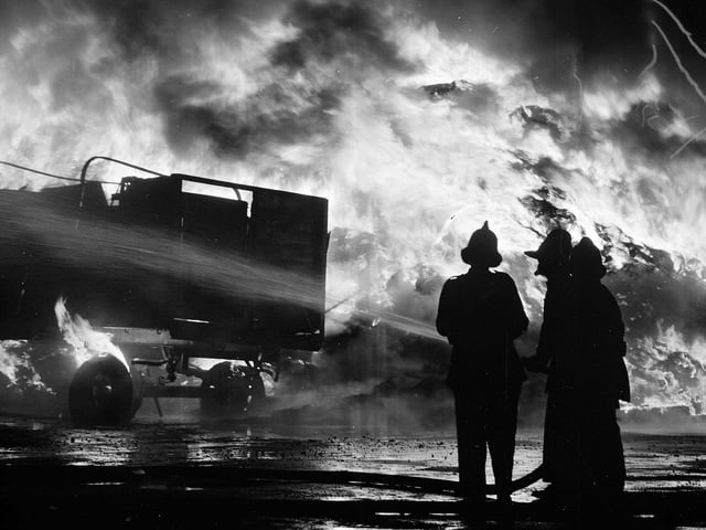 Firemen take on the flames during the blaze that hit the yard in 1965.