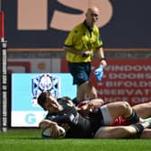 Sebastian Cancelliere of Glasgow Warriors scores his team's first try.