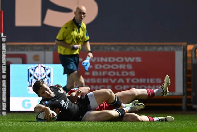 Sebastian Cancelliere of Glasgow Warriors scores his team's first try.