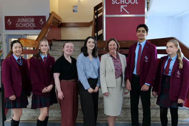 Staff and pupils with Claire Kinloch Anderson, UK country manager at WEP UK.