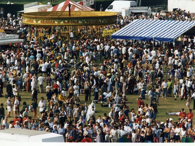 Crowds attend Fringe Sunday 1995 at Holyrood Park.