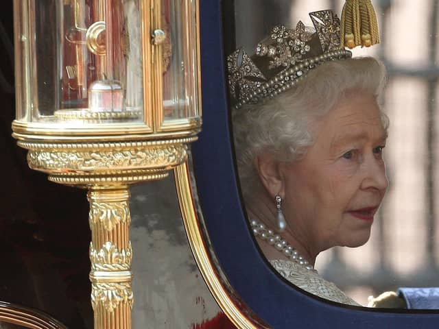 The Queen returns to Buckingham Palace after attending the State Opening of Parliament in 2010. The Queen's famous Diamond Diadem and jewels from the monarch's collection are to go on show at royal residences to mark the Platinum Jubilee.