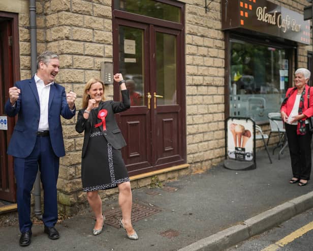 Kim Leadbeater, sister of the murdered MP Jo Cox, and Labour leader Keir Starmer celebrate her narrow victory in the Batley and Spen by-election as her mother Jean Leadbeater looks on (Picture: Christopher Furlong/Getty Images)