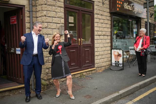 Kim Leadbeater, sister of the murdered MP Jo Cox, and Labour leader Keir Starmer celebrate her narrow victory in the Batley and Spen by-election as her mother Jean Leadbeater looks on (Picture: Christopher Furlong/Getty Images)