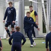 Chris Harris is at the centre of the action during a Scotland training session at the Oriam. Picture: Craig Williamson/SNS