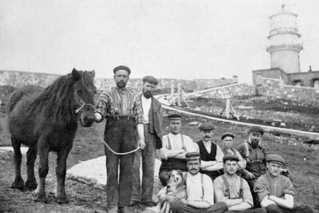 Lighthouse builders and their pony - which was also winched up the cliff - on the Flannan Isles. More research is set to be carried out into the men who constructed the lighthouse. PIC:  Courtesy of Urras an Taighe Mhòir.