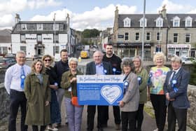Councillors and businesses join forces in Ellon to promote the Scotland Loves Local Pledge – signed by Aberdeenshire Council leader Cllr Gillian Owen on behalf of the local authority
