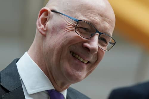John Swinney at the Scottish Parliament in Edinburgh, after he became the first candidate - and likely only one - to declare his bid to become the new leader of the SNP and Scotland's next first minister. Picture: Andrew Milligan/PA Wire