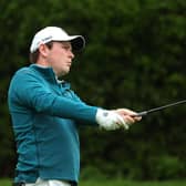 Bob MacIntyre plays his second shot on the 13th hole during the second round of the Betfred British Masters hosted by Danny Willett at The Belfry. Picture: Andrew Redington/Getty Images.