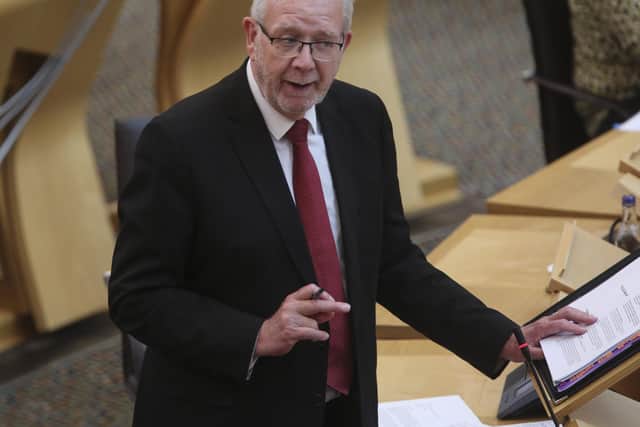 EDINBURGH, SCOTLAND - JUNE 9: Mike Russell, MSP Cabinet Secretary for Government Business and Constitutional Relations, makes a ministerial statement, reporting to Parliament on the Coronavirus Acts at the Covid-19 social distancing Scottish Parliament, Holyrood on June 9, 2020 in Edinburgh, Scotland. (Photo by Fraser Bremner - WPA Pool/Getty Images)