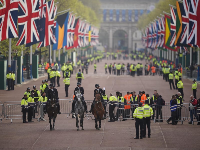 Mounted officers from the Metropolitan Police arrive on The Mall in London ahead of the coronation ceremony of King Charles III and Queen Camilla. Picture, Niall Carson/PA Wire