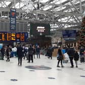 Rail passengers such as at Glasgow Central Station - Scotland's busiest - face significant disruption until at least January 7. Picture: The Scotsman