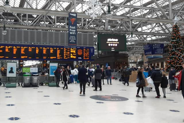 Rail passengers such as at Glasgow Central Station - Scotland's busiest - face significant disruption until at least January 7. Picture: The Scotsman