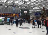 Rail passengers such as at Glasgow Central Station - Scotland's busiest - face significant disruption until at least January 7. Picture: The Scotsman