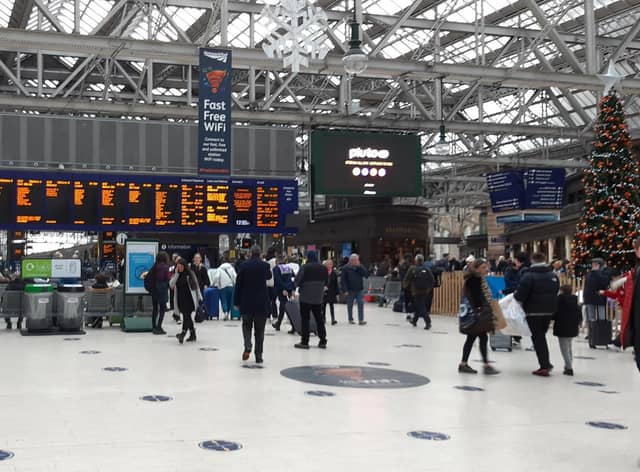 Rail passengers such as at Glasgow Central Station - Scotland's busiest - face significant disruption until at least January 7. Picture: The Scotsman