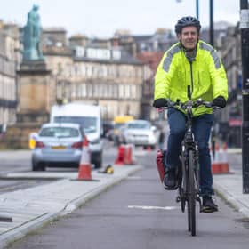 The Scotsman's Transport Correspondent Alastair Dalton testing the route in Melville Street on Monday. (Photo by Lisa Ferguson/The Scotsman)