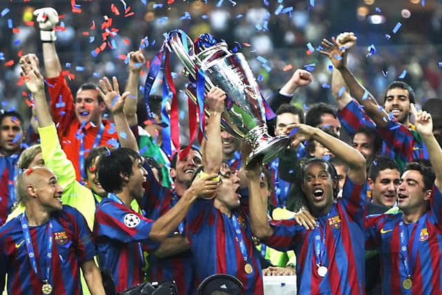 Giovanni van Bronckhorst (left) experienced the ultimate in European success when he won the Champions League as a Barcelona player in 2006. (Photo by LLUIS GENE/AFP via Getty Images)