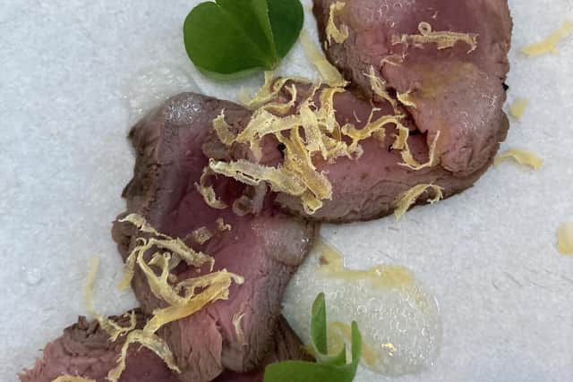 Venison carpaccio, wood sorrel and blackcurrant leaf vinaigrette - one of the courses of the menu created from the foraged plants. Pic: Fiona Laing