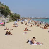 People socially distancing on Palma's City Beach. Pictures/ video: Ruairidh Mason