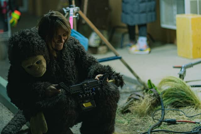 Nina Conti directing on the set of her film Sunlight, in which she plays a woman hiding inside a monkey suit. Pic: CsT Photography