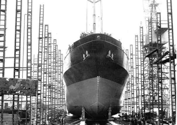 The cargo ship 'Kaitoa', weighing 2583 gross tonnes, is launched from Henry Robb Shipyard in Leith in  1956