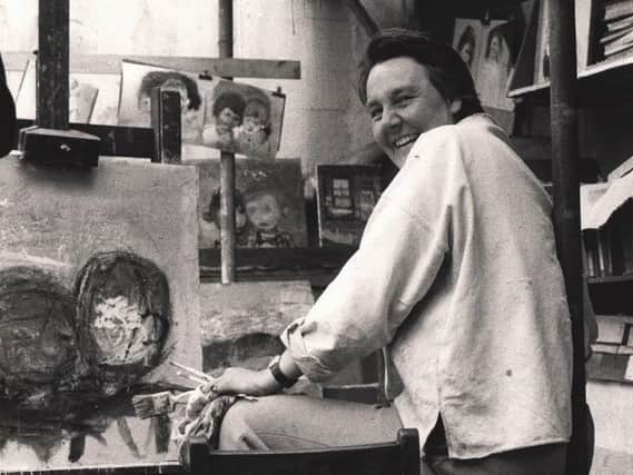 Joan Eardley captured by Oscar Marzaroli at her Glasgow studio.