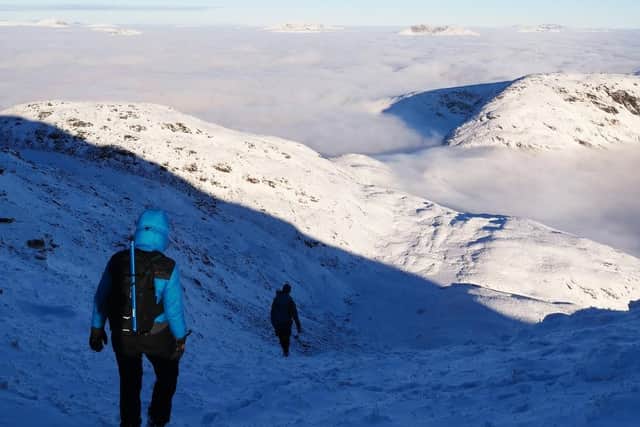 Walkers were equipped with ice axes and crampons for the ascent to the Munro's summit
