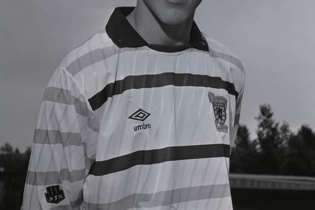 Sold for: 275. Sporting the yellow and red of the lion rampant, this away kit was reimagined during the 2014/15 season. The original Umbro effort can be sold for as much as 275.