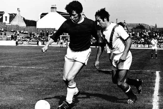 Falkirk's John Lambie shields the ball from Airdrie opponent Drew Jarvie during a 1970 clash at Broomfield Park