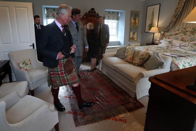 The Prince of Wales, known as the Duke of Rothesay while in Scotland, tours the Granary Accommodation, which he officially opened during a visit to the Castle of Mey in Caithness.