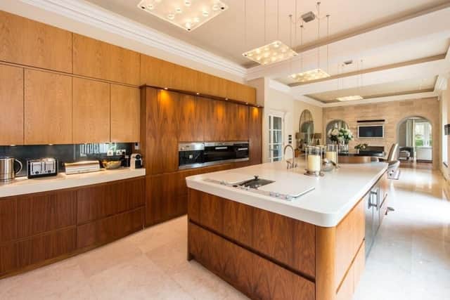 The spacious, open-plan kitchen is the heart of the home.