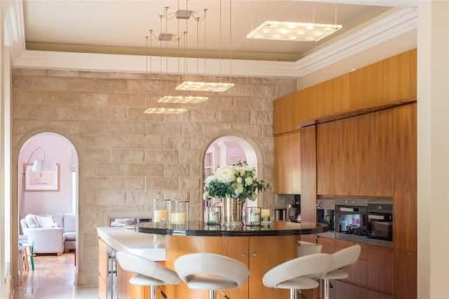 The kitchen also has a dining area.