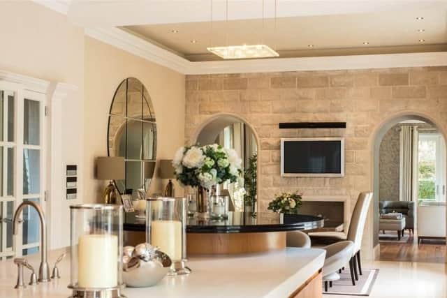The kitchen space also has a more formal dining area.